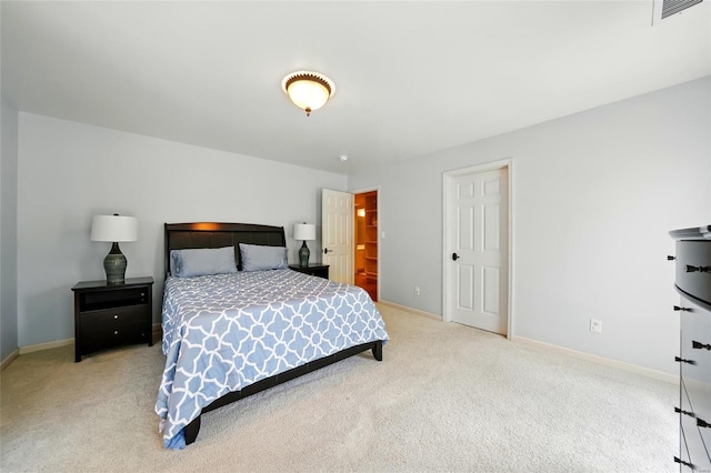 bedroom with carpet floors, visible vents, and baseboards