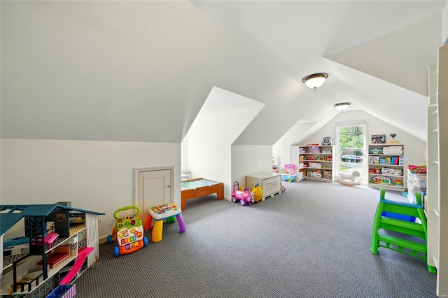 recreation room featuring vaulted ceiling and carpet floors