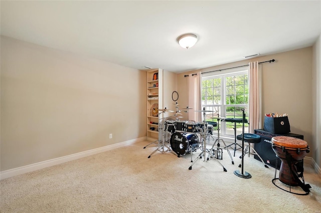 rec room featuring baseboards, carpet flooring, and visible vents