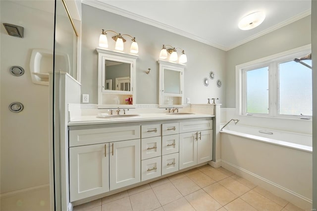 full bath with a bath, tile patterned floors, a sink, and double vanity