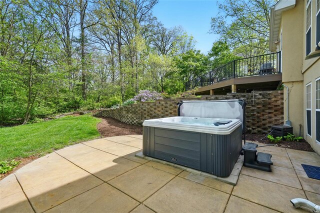 view of patio / terrace featuring a hot tub