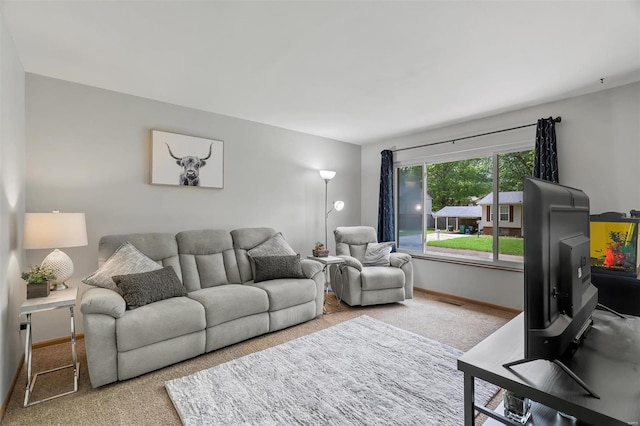 carpeted living room with baseboards and visible vents