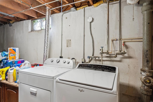 washroom with washer and dryer and laundry area