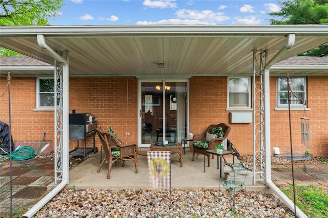 view of patio with a grill
