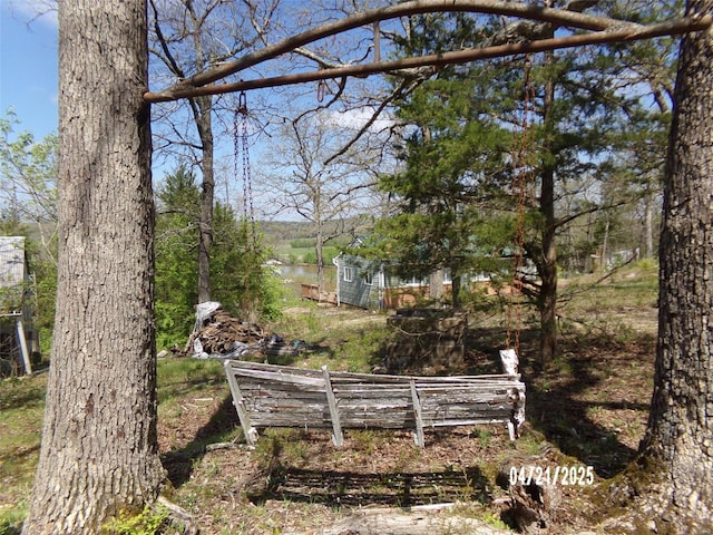 surrounding community featuring a water view