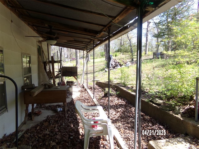 view of yard with a ceiling fan