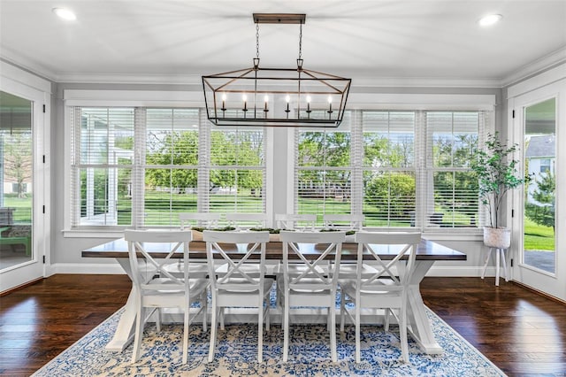 sunroom featuring a notable chandelier