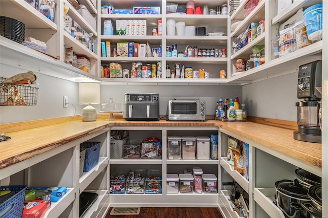 pantry featuring a toaster