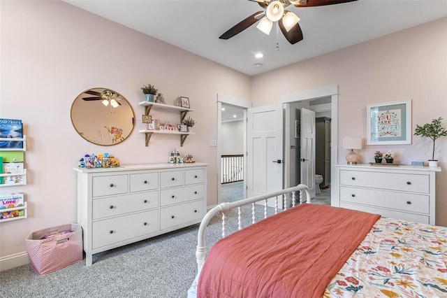 carpeted bedroom with a ceiling fan and recessed lighting