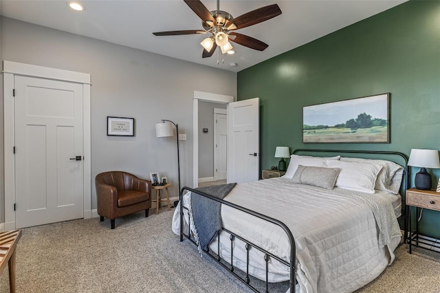 carpeted bedroom featuring recessed lighting, a ceiling fan, and baseboards