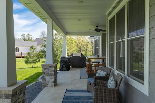 view of patio featuring a porch, ceiling fan, and area for grilling