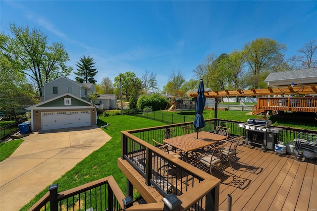 wooden deck featuring fence, a garage, area for grilling, outdoor dining area, and a lawn