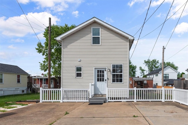 rear view of house with a patio