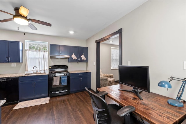 kitchen featuring blue cabinets, gas range, dishwasher, a sink, and under cabinet range hood