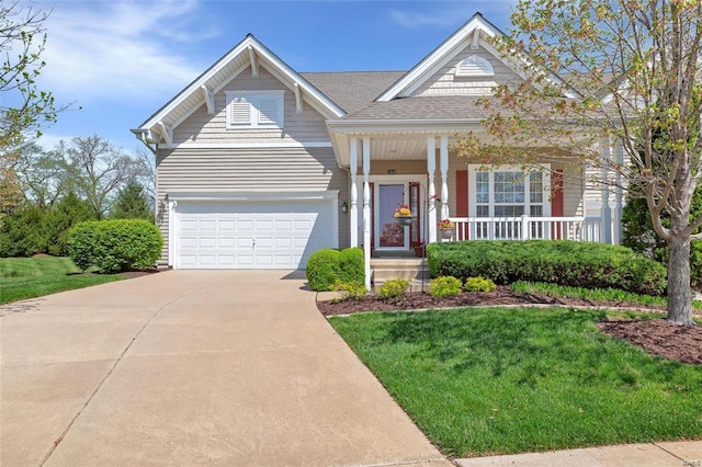 craftsman-style house with a garage, a front lawn, roof with shingles, a porch, and driveway