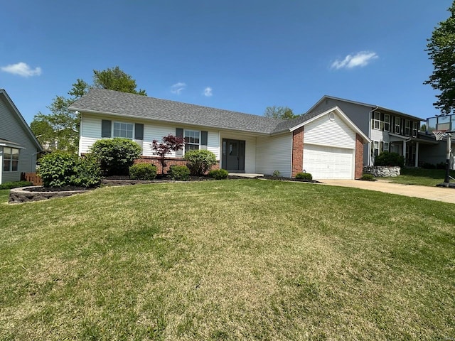 single story home featuring brick siding, a garage, driveway, and a front yard