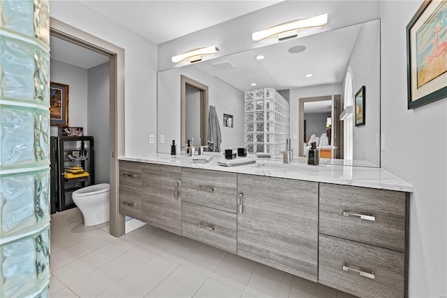 full bath with toilet, recessed lighting, tile patterned flooring, and vanity