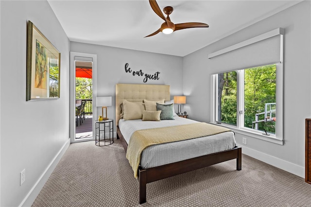 bedroom featuring baseboards, ceiling fan, carpet flooring, and access to exterior