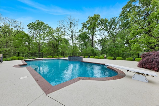 view of swimming pool with a fenced in pool, fence, and a patio