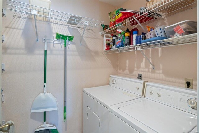 laundry area featuring laundry area and independent washer and dryer