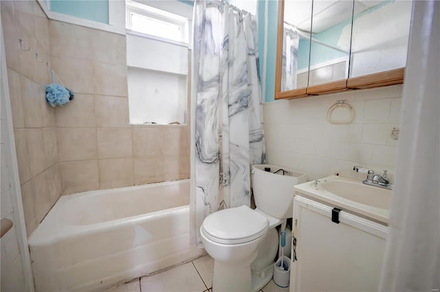 bathroom with tile patterned flooring, vanity, toilet, and shower / bath combo