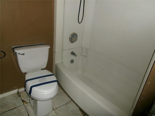 full bathroom with toilet, shower / washtub combination, tile patterned floors, and baseboards