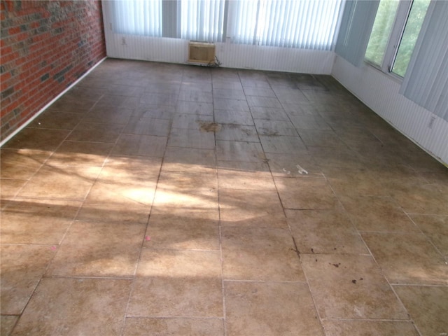 empty room with brick wall