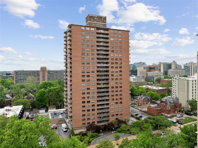 view of building exterior featuring a city view