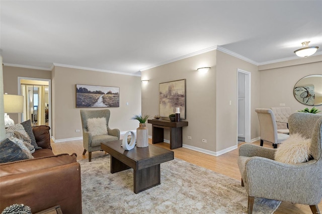 living room with crown molding, baseboards, and wood finished floors