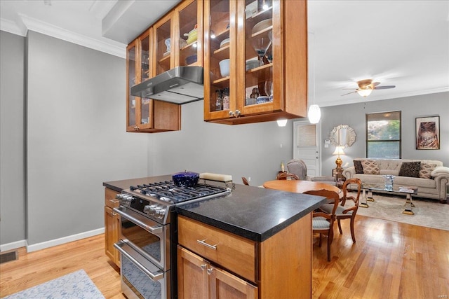 kitchen with crown molding, brown cabinetry, under cabinet range hood, light wood-style flooring, and double oven range