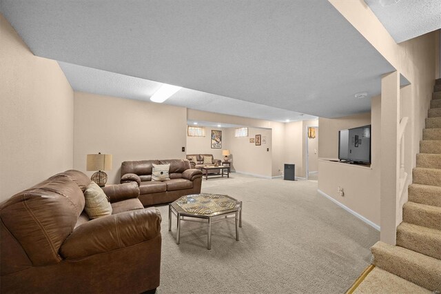 living room featuring baseboards, stairs, and light colored carpet
