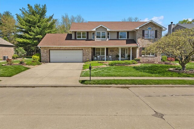 traditional home featuring a front lawn, a porch, concrete driveway, brick siding, and an attached garage