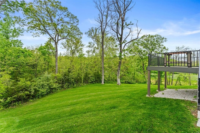 view of yard featuring a wooden deck