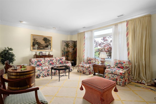 living room featuring visible vents and ornamental molding
