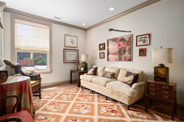 living room with crown molding, recessed lighting, baseboards, and visible vents