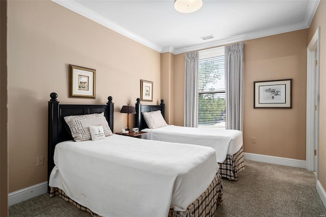 bedroom with crown molding, baseboards, carpet, and visible vents