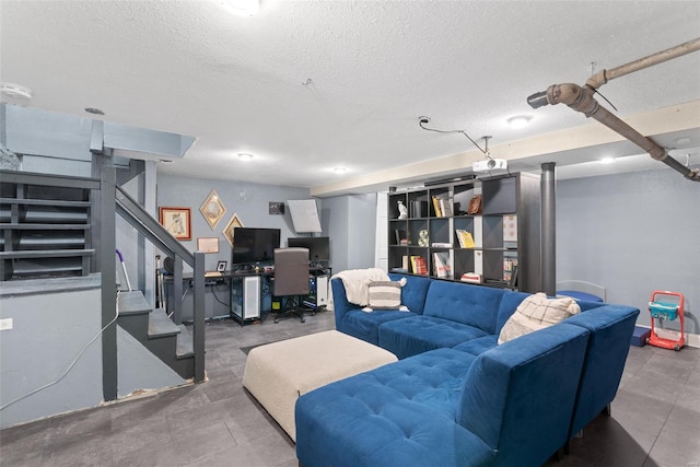 living area featuring a textured ceiling and stairway