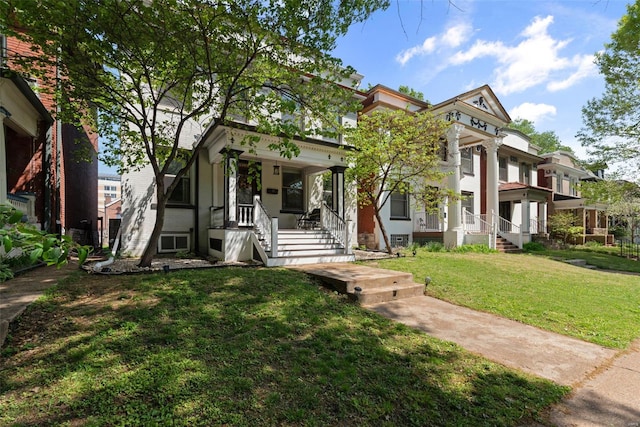 view of front of home featuring a porch and a front lawn