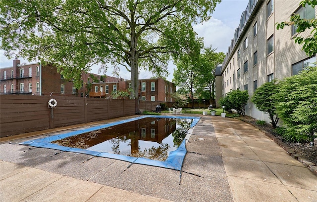 pool featuring fence