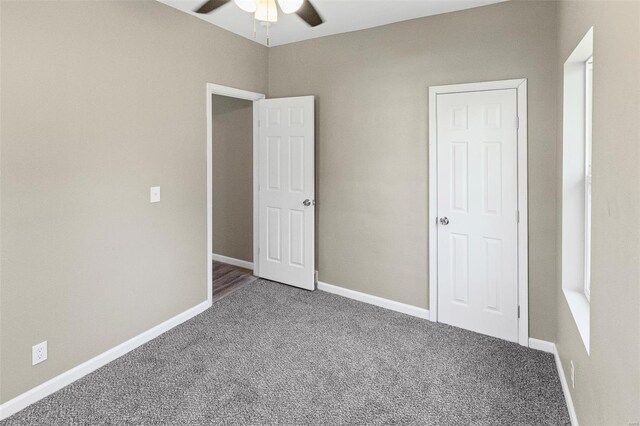 unfurnished bedroom featuring baseboards, ceiling fan, and carpet floors