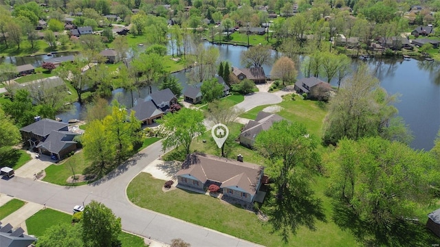 bird's eye view with a residential view and a water view