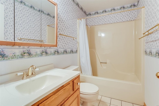 bathroom featuring vanity, shower / bath combination with curtain, toilet, wallpapered walls, and tile patterned floors