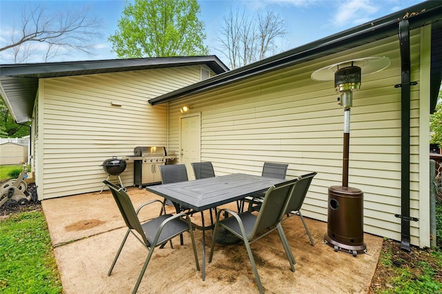 view of patio / terrace featuring grilling area and outdoor dining area