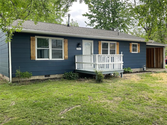 ranch-style house with a wooden deck, roof with shingles, crawl space, and a front lawn