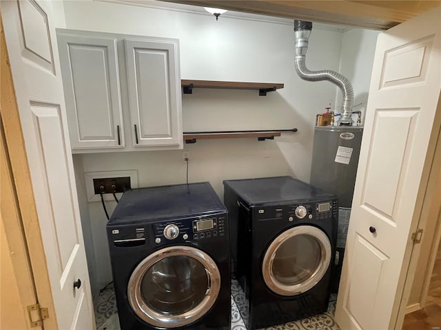 laundry area featuring cabinet space and washer and clothes dryer
