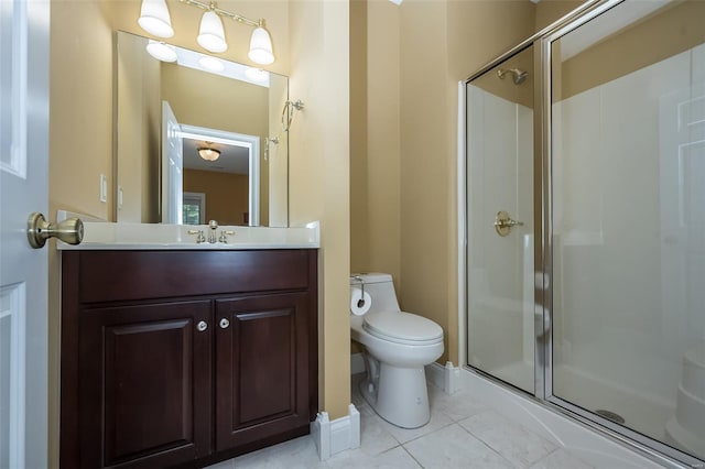 full bath with tile patterned floors, vanity, toilet, and a stall shower