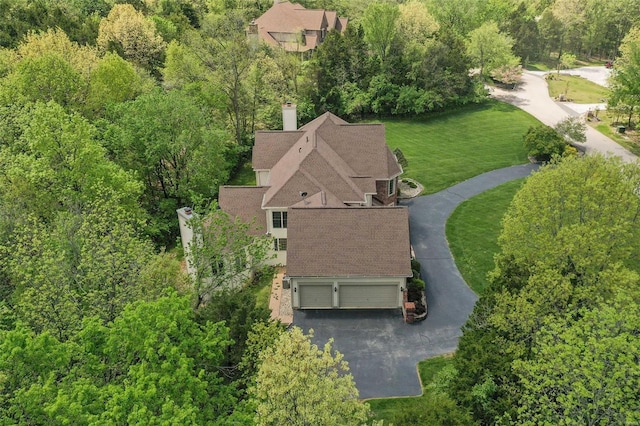 drone / aerial view with a forest view