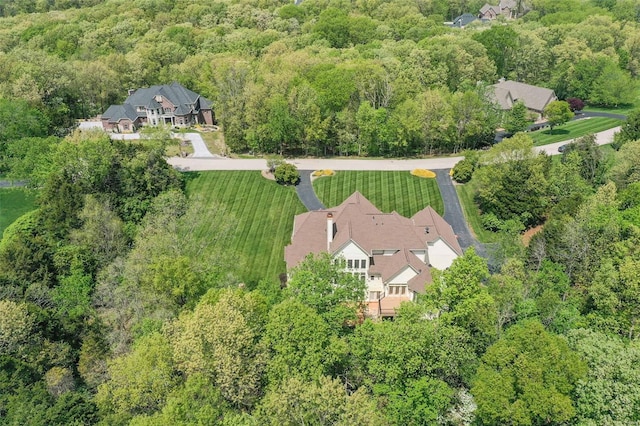 aerial view featuring a view of trees