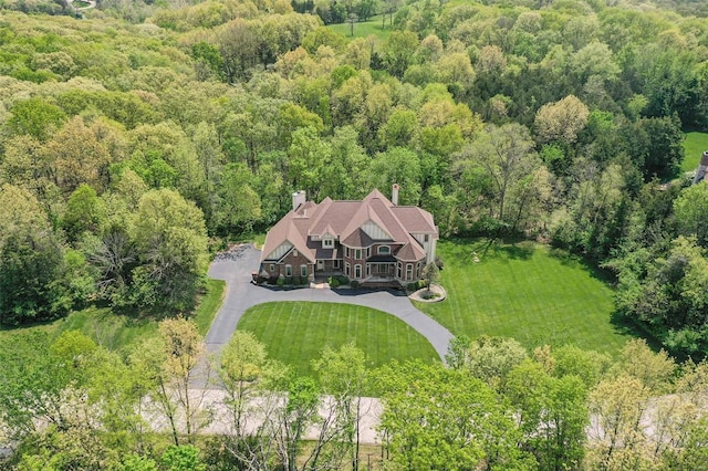 bird's eye view featuring a view of trees