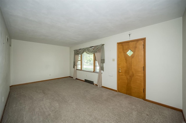 interior space featuring visible vents and baseboards